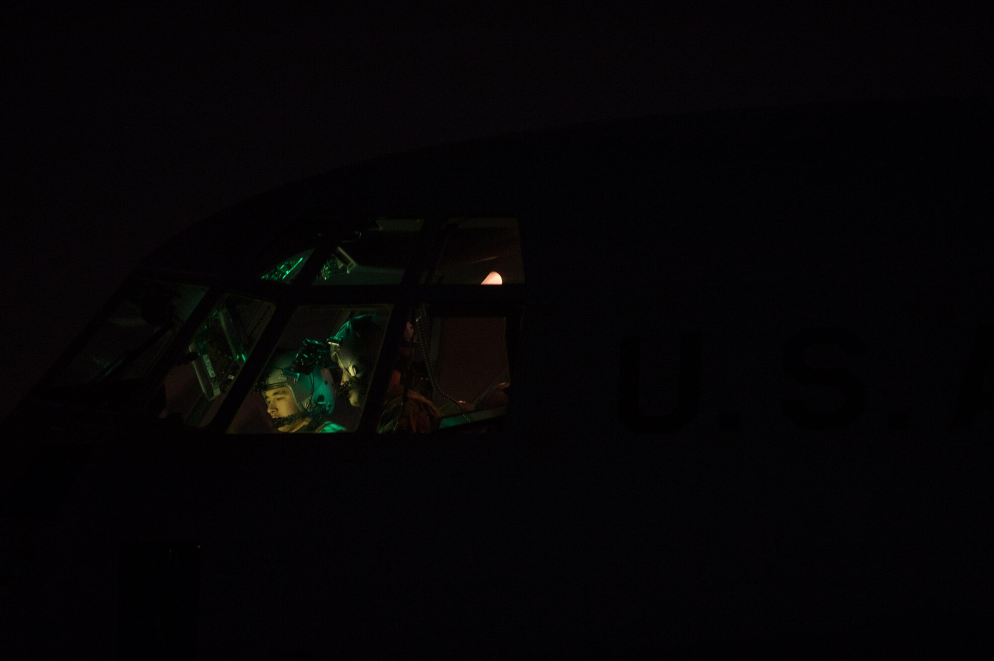 U.S. Airmen assigned to the 774th Expeditionary Airlift Squadron, go over preflight checks on a C-130J Super Hercules aircraft on the flight line at Bagram Airfield, Afghanistan, Aug. 7, 2015.  The aircraft is maintained by the 455th Expeditionary Aircraft Maintenance Squadron ensures Super Hercules on Bagram are prepared for flight and return them to a mission-ready state once they land. (U.S. Air Force photo by Tech. Sgt. Joseph Swafford/Released)