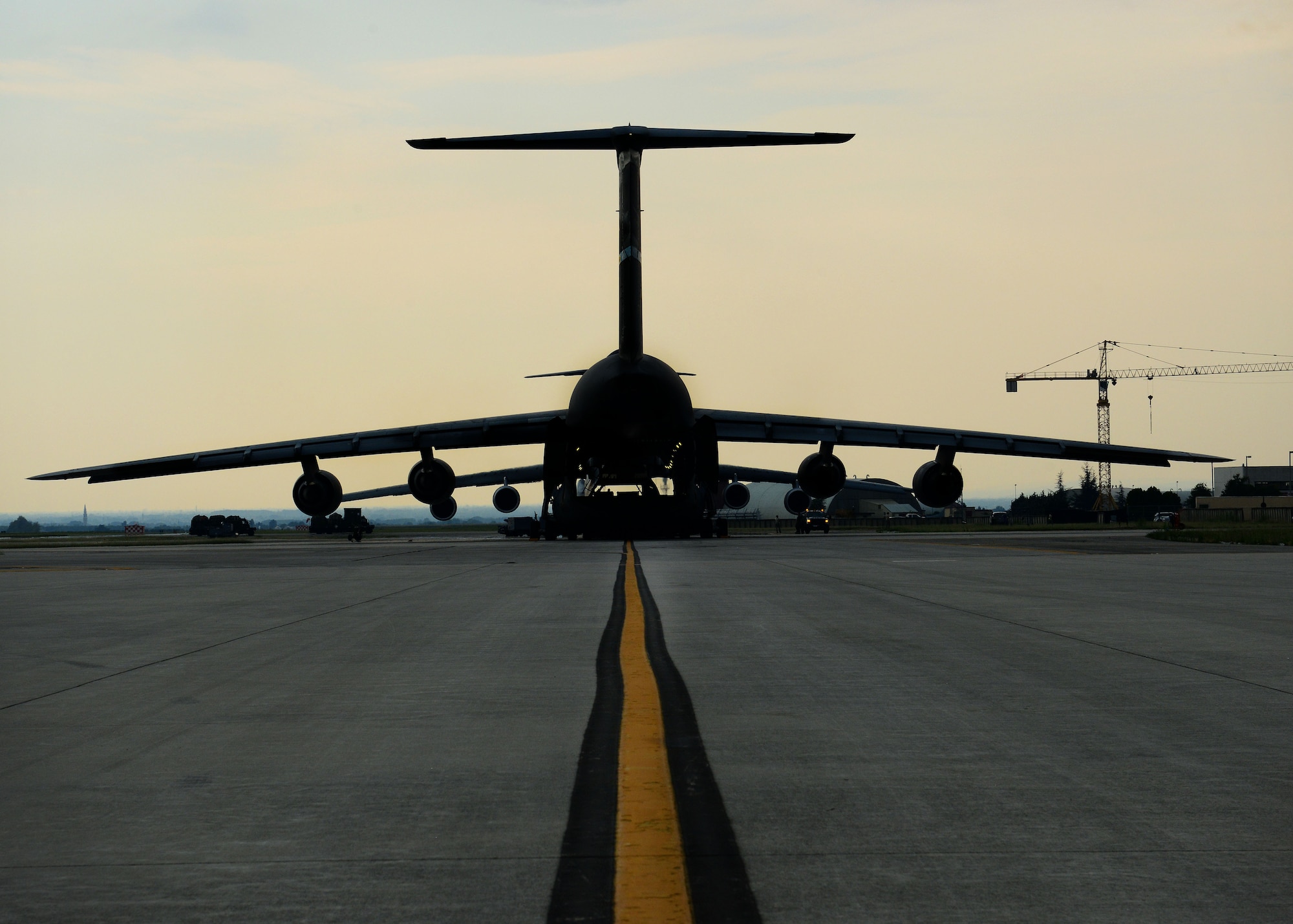 Cargo is loaded onto a C-5 Super Galaxy from the 436th Airlift Wing Aug. 8, 2015, at Aviano Air Base, Italy. The cargo will be delivered to Incirlik Air Base, Turkey, in support of Operation Inherent Resolve. This deployment coincides with Turkey's decision to host U.S. aircraft to conduct counter-ISIL operations. (U.S. Air Force photo by Airman 1st Class Deana Heitzman)