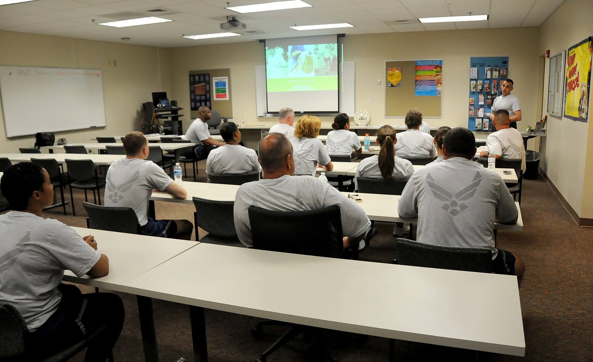 The 192nd Fighter Wing Unit Fitness Program conducted its first “Running Clinic Rx” for service members at Joint Base Langley-Eustis, Virginia July 18, 2015. The clinic began with a classroom briefing that presented tips and techniques for the proper running form, running shoes for different foot types, and good overall health habits. The techniques presented were meant to help airmen improve their running to prevent injury and improve success for the running portion of the annual Physical Training test. (U.S. Air National Guard photo by Airman 1st Class Johnisa B. Roberts/Released)
