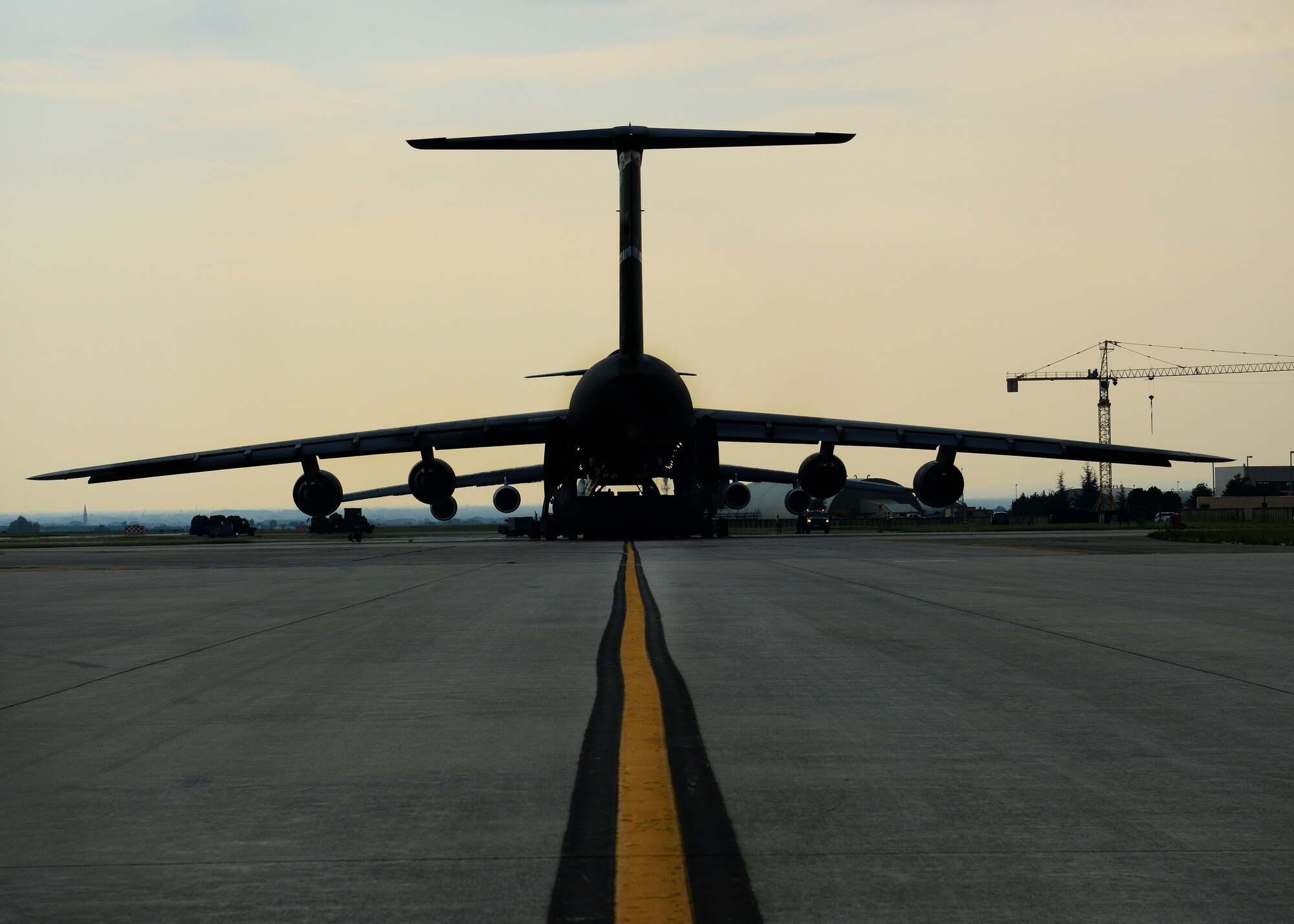 Cargo is loaded onto a C-5 Super Galaxy assigned to the 436th Airlift Wing, Aug. 8, 2015, at Aviano Air Base, Italy. The cargo will be delivered to Incirlik Air Base, Turkey in support of Operation Inherent Resolve. This deployment coincides with Turkey's decision to host U.S. aircraft to conduct counter-ISIL operations. (U.S. Air Force photo by Airman 1st Class Deana Heitzman/Released)
