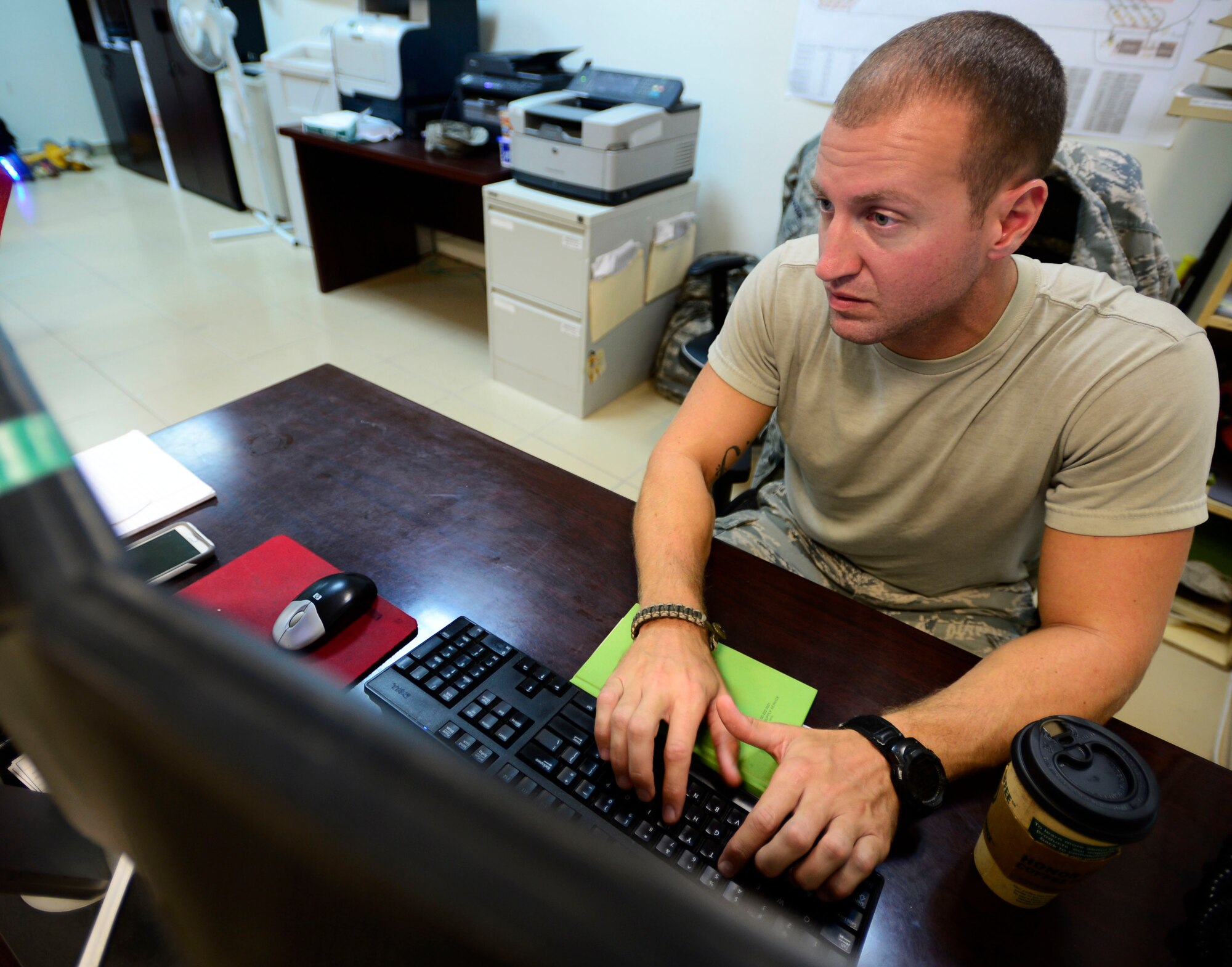 U.S. Air Force Staff Sgt. Kristopher Sosebee, 386 Expeditionary Operations Support Squadron deputy airfield manager, updates a spreadsheet during Operation Inherent Resolve at an undisclosed location in Southwest Asia, Aug. 4, 2015. To stay one step ahead of the Da’esh, airfield management procures, maintains, and produces information regarding safe operation of aircraft on the airfield and through the national and international airspace. (U.S. Air Force photo by Senior Airman Racheal E. Watson/Released)