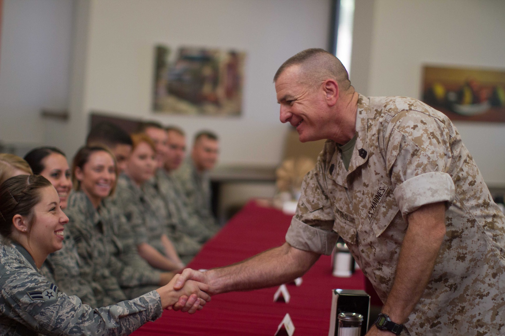 U.S. Marine Corps Sgt. Maj. Bryan Battaglia, senior enlisted advisor to the chairman of the Joint Chiefs of Staff, talks with Missouri Air and Army Guard members on a recent visit to Springfield, Missouri. Battaglia met with enlisted personnel from all branches of service in an effort to gauge issues service members may be dealing with, as well as offer counsel and guidance to issues facing leadership today. 