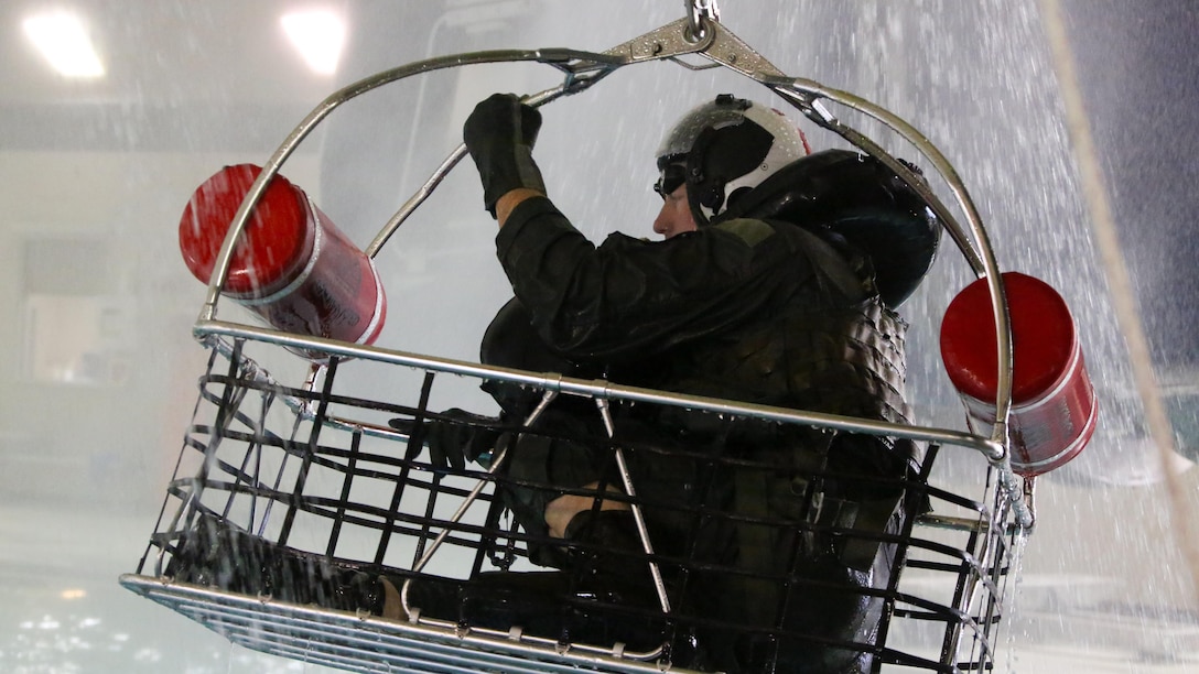 Capt. Colin Marty participates in water survival training at Marine Corps Air Station Cherry Point, North Carolina, July 28, 2015. The Aviation Survival Training Center is the only water survival facility on any Marine Corps installation on the East Coast. Naval aviators are given classes on protocol and the gear they use in case of an emergency on an aircraft. The skills they learn in ASTC ensure 2nd Marine Aircraft Wing, its aviators and crew members are qualified and maintain the highest state of readiness. Marty is a pilot with 3rd Battalion, 6th Marines, 2nd Marine Division stationed at Marine Corps Base Camp Lejeune.