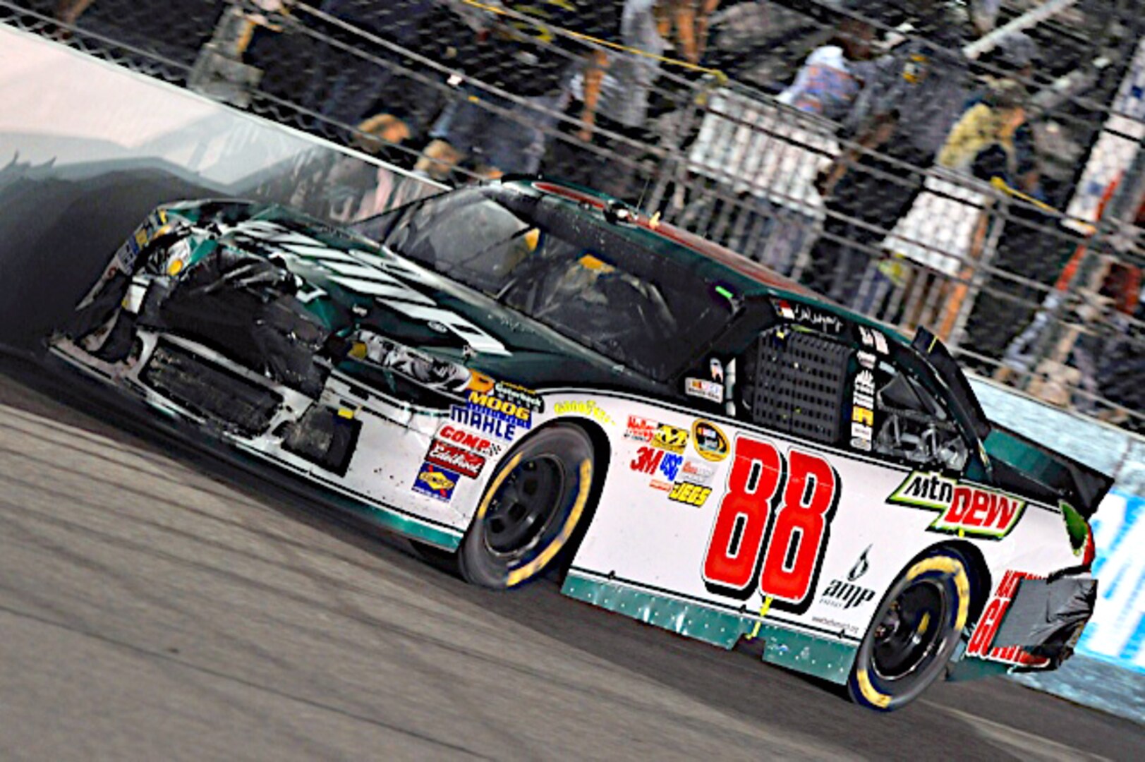 Dale Earnhardt Jr., driver of the No. 88 National Guard racecar, works his way around the track after being nudged by another competitor into an early turn-four accident at Richmond International Speedway, Sept. 10, 2011, in Richmond, Va. Earnhardt is locked into the 10th seed as the seasons best head into the post-season Chase for the Cup.
