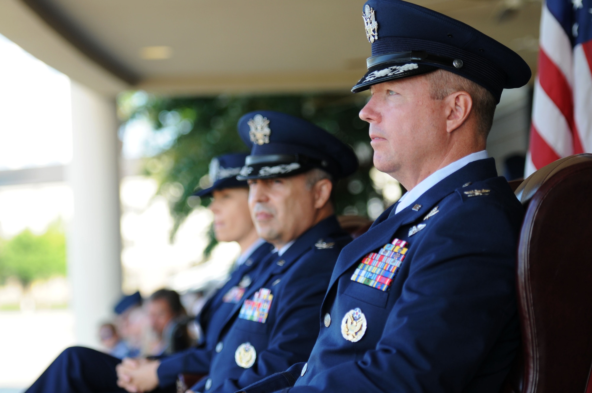 Col. Scott Solomon, 81st Training Group commander, watches Airman march in formation during a change of command ceremony, August 7, 2015, Keesler Air Force Base, Miss.  Solomon assumed command from Col. George Tombe, who has been selected to serve as the financial management and comptroller director at Headquarters USAFE-AFAFRICA. Col. Michele Edmondson, 81st Training Wing commander, was the officiating officer for the ceremony. (U.S. Air Force photo by Kemberly Groue)