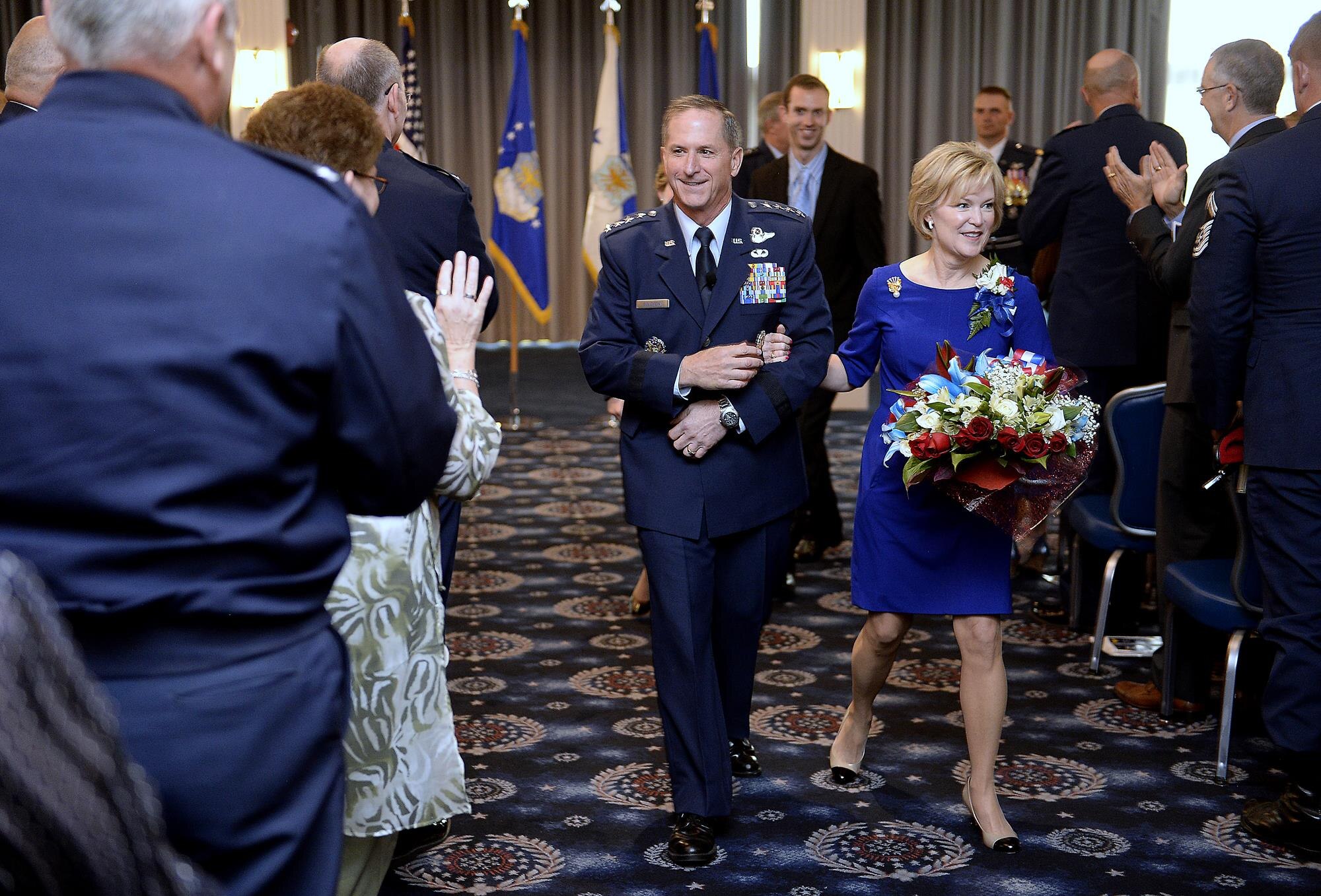 Gen. David L. Goldfein and his wife, Dawn, depart the revue where he was promoted during a ceremony Aug. 6, 2015, in Washington, D.C. Goldfein will become the Air Force's 38th vice chief of staff and most recently served as the director of the Joint Staff. (U.S. Air Force photo/Scott M. Ash)