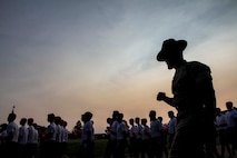 Drill instructor Sgt. George Martinez marches a platoon of applicants during Recruiting Station Lansing’s Mini Boot Camp South aboard Fort Custer Training Center, Mich., July 10, 2015. Mini Boot Camp South is a three-day simulation of Marine Corps recruit training intended to prepare applicants for the 13-week transformation aboard Marine Corps Recruit Depot San Diego, Calif., or Parris Island, S.C.