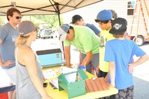 Jeffery Watts signs up family for Tiny Home Build Weekend August 8.