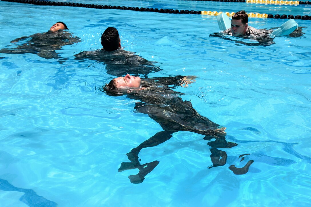 Paratroopers tread water during combat water survival training at Fort Bragg, N.C., July 29, 2015.