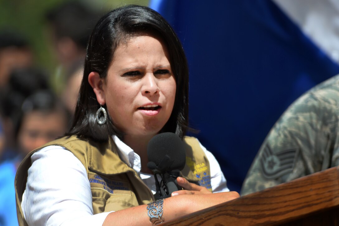 Ghisell Padilla, Colón Department Governor speaks at the ribbon-cutting ceremony for the new two-classroom schoolhouse at the Gabriela Mistral school in Ocotes Alto, Honduras, July 28, 2015.