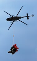 Aircrew members of the 908th Airlift Wing make their way to a 20-man raft during recent water survival training.