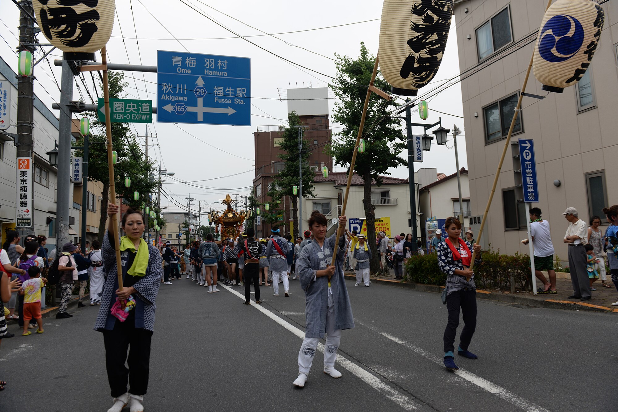 Local residents dance through the streets as part of a parade during the Tanabata Festival in Fussa City, Japan, Aug. 7, 2015. The festival included several parades as well as street vendors selling a variety of traditional Japanese festival foods.  (U.S. Air Force photo by Airman 1st Class Elizabeth Baker/Released)