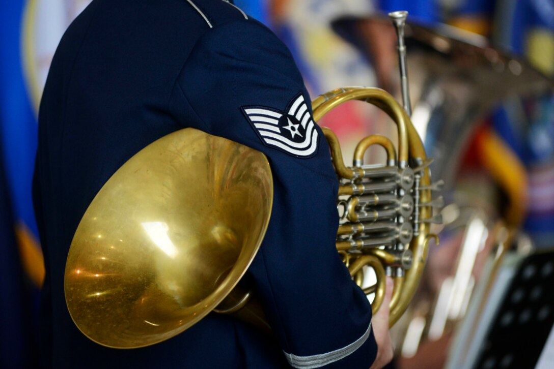 An airman holds an instrument during the 349th Air Mobility Wing Change of Command ceremony at Travis Air Force Base, August 8th, 2015. (Aaron Rosenblatt/Daily Republic)