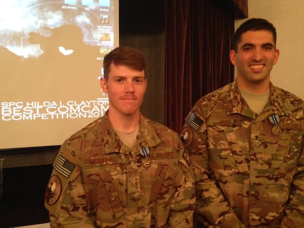 Staff Sgt. Steven Witt, 1st Combat Camera Squadron combat broadcaster, and Staff Sgt. Samuel Weaver, 1st CTCS combat cyber transportation specialist and photographer, finished in first place after a rigorous week-long event hosted by the U.S Army 55th Signal Company (Combat Camera) designed to test the technical and tactical skills of 12 visual information teams. (Courtesy photo)  