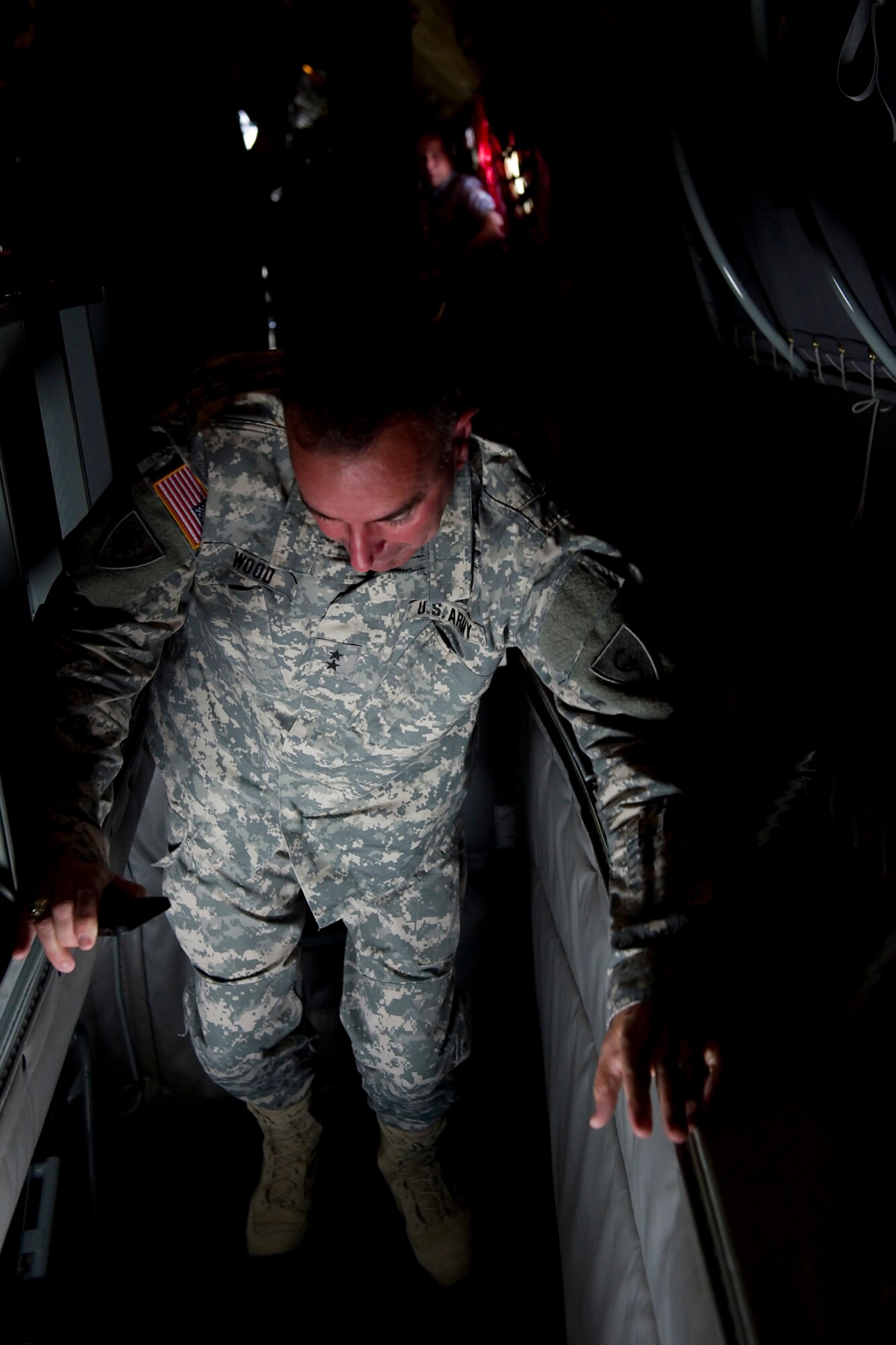 Maj. Gen. David Wood, 38th Infantry Division commander, Indianapolis Ind., climbs out of the boom pod of a KC-135R Stratotanker during an Indiana Employer Support of the Guard and Reserve event held here Aug. 7, 2015. The purpose of the event is to help educate Guard and Reserve employers on what their employees do in support of America’s defense. (U.S. Air Force photo/Senior Airman Jami K. Lancette) 
