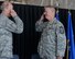 Outgoing New Hampshire Air National Guard State Command Chief Master Sgt. Matthew Collier salutes Maj. Gen. William N. Reddel III, N.H. National Guard adjutant general, during a change of authority ceremony at Pease Air National Guard Base, N.H., Aug. 9, 2015.  During the ceremony Collier relinquished authority to N.H. Command Chief Master Sgt. David Obertanec. (U.S. Air National Guard photo by Staff Sgt. Curtis J. Lenz)