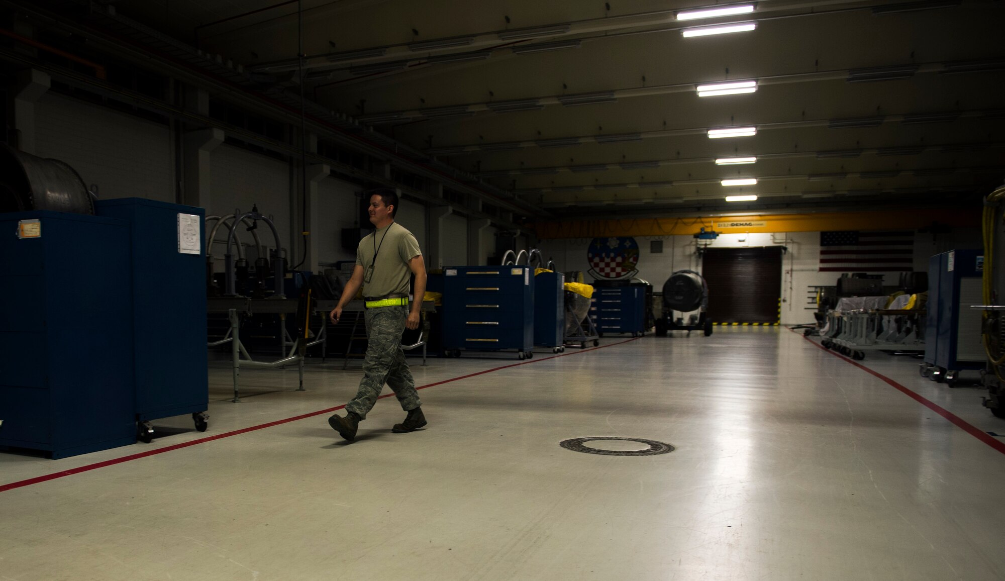 U.S. Air Force Staff Sgt. Jacob Pope, a 52nd Component Maintenance Squadron aerospace propulsion craftsman, shuts down the maintenance shop for the night during a graveyard shift on Spangdahlem Air Base, Germany, August 5, 2015. The 52nd CMS utilizes both day shifts and swing shifts and are required to clean up after themselves and close down the shop until day-shift workers come into shop several hours later. The graveyard shift, also referred to as a swing shift, is a period of time when Airmen work from nighttime through early morning hours. (U.S. Air Force photo by Airman 1st Class Timothy Kim/Released)