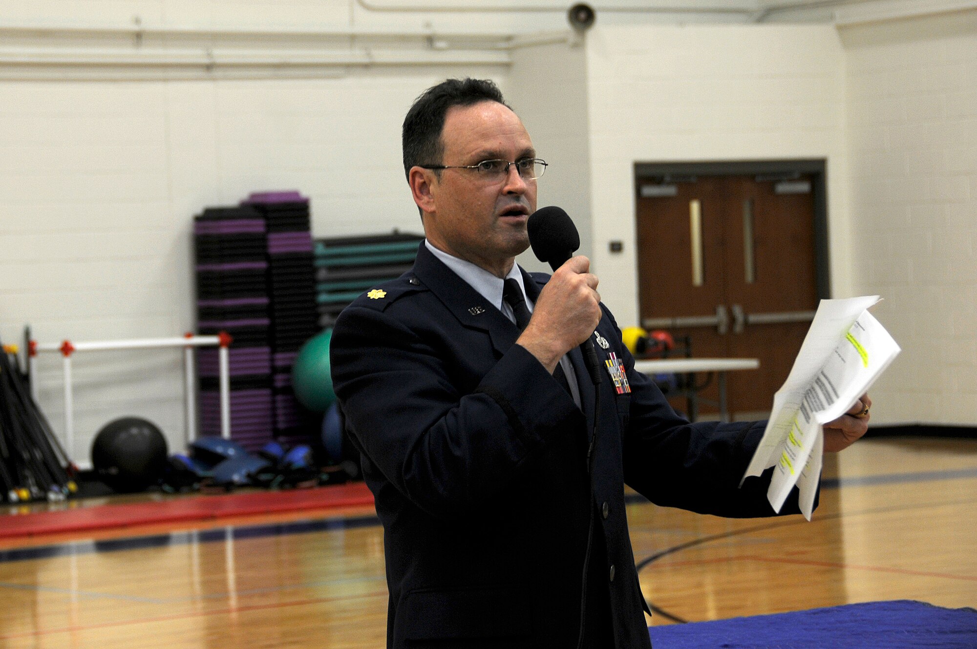 Maj. Javier Rodriguez, 482nd Maintenance Squadron commander addresses a group of Airmen during a Commander's Call held in the Sam Johnson Fitness Center at Homestead Air Reserve Base Fla., on Aug. 8 2015. Members of the maintenance squadron come together for this briefing to discuss future deployments which will be occur over the next few years. (U.S. Air Force photo/Senior Airman Aja Heiden)
