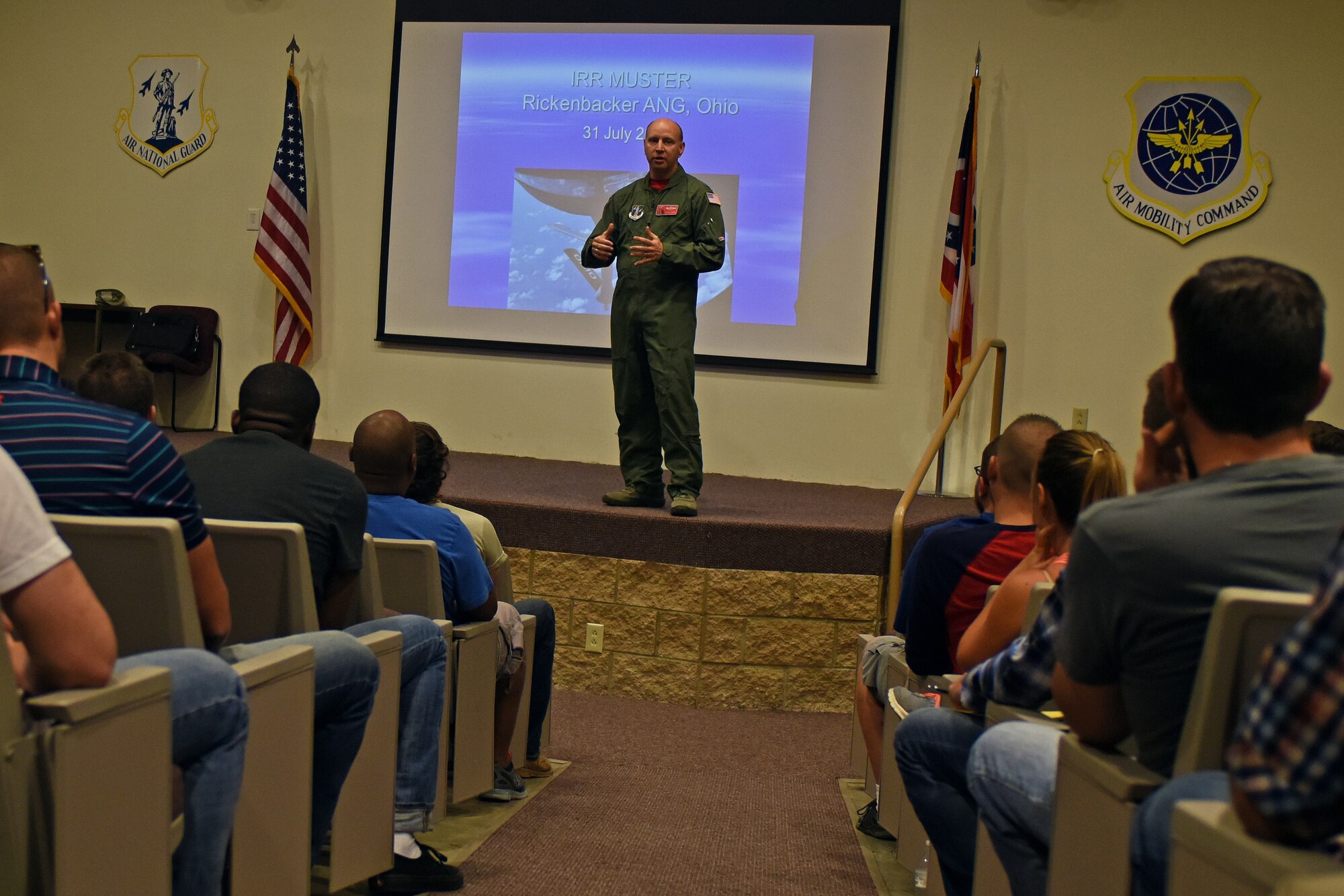 U.S. Air Force Col. Mark D. Auer, commander of the 121st Air Refueling Wing, speaks to members of the Individual Ready Reserve during a Muster held July 31, 2015 at Rickenbacker Air National Guard Base, Ohio. IRR members are veterans that have time remaining on their statutory military service obligation of eight years and are required to participate in an annual screening until their remaining service time is completed. (U.S. Air National Guard photo by Airman Ashley Williams/Released)