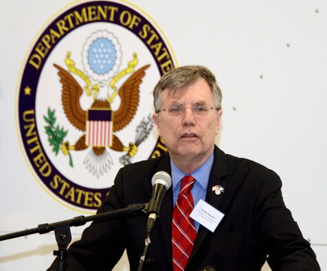Patrick Kennedy, Under Secretary of Management, from the United States Department of State, addresses an audience of personnel from the Department of State, MRI Global, Paul Allen Foundation, and members of the 94th Airlift Wing, at an unveiling of the DOS Containerized Biocontainment System, held at Dobbins Air Reserve Base, Ga. Aug. 11, 2015. (U.S. Air Force photo/Don Peek)