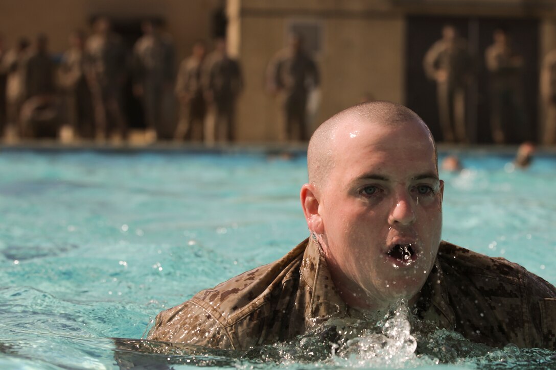 Lance Cpl. Korry Zippeper, motor transport mechanic with Company C, 4th Assault Amphibian Battalion, 4th Marine Division, Marine Forces Reserve, performs the 250-meter swim during his annual intermediate swim qualification at the Galveston Marine Corps Reserve Home Training Center, Aug. 8, 2015. All Marines with Company C. are required to complete and maintain an annual intermediate swim qualification.  (U.S Marine Corps photo by Corporal Ian Ferro)