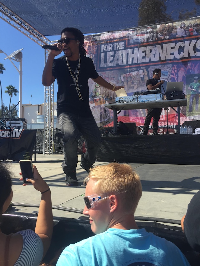 Lupe Fiasco, singer, performs for service members aboard Marine Corps Air Station Miramar, California, August 8. The event also featured comedians Deray Davis and Shayma Tash. (U.S. Marine Corps photo by Lance Cpl. Kimberlyn Adams/Released)


