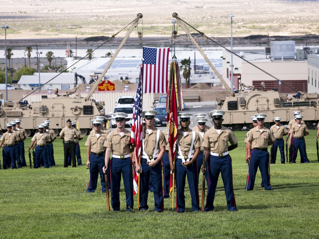 Marines with 1st Tank Battalion stand in formation during a retirement ceremony for 1st Sgt. Nelson A. Hidalgo, Company A First Sergeant, 1st Tanks, at Lance Cpl. Torrey L. Gray Field, Aug. 7, 2015. Hidalgo left the Marines of 1st Tanks with one last piece of advice, reminding them to find time to enjoy their work. (Official Marine Corps photo by Pfc. Levi Schultz/Released)