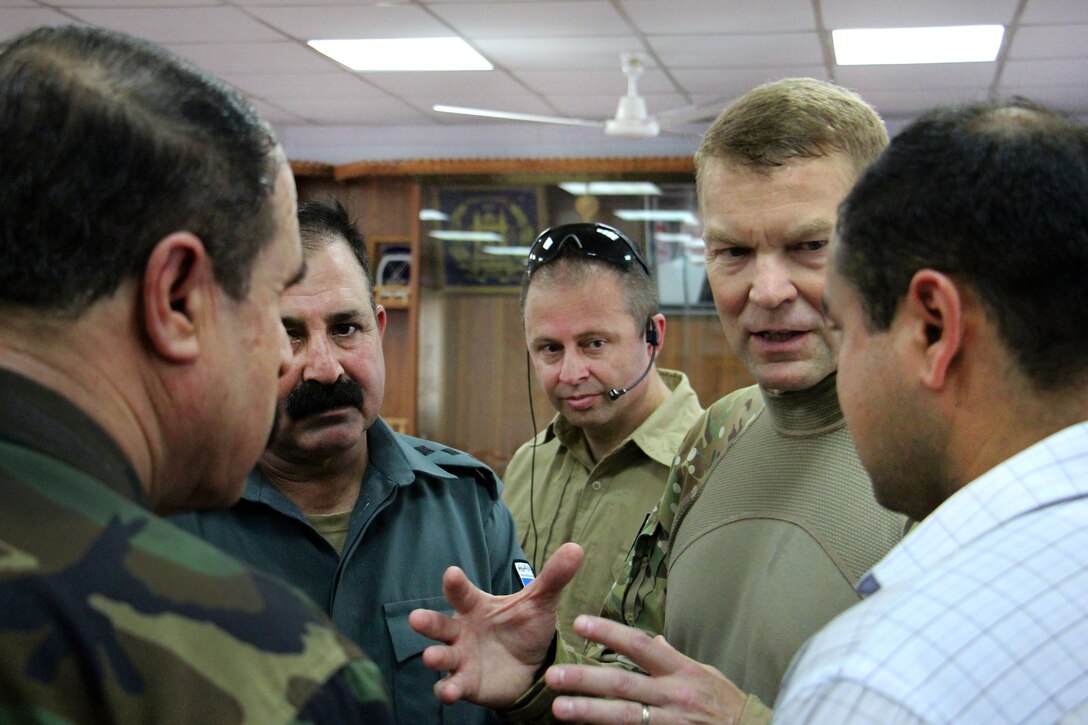 U.S. Army Maj. Gen. Jeffrey Buchanan, center right, the Resolute ...