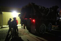 U.S. Marines with Headquarters Company, 3rd Battalion, 7th Marine Regiment, Special Purpose Marine Air-Ground Task Force-Crisis Response-Central Command, climb into a truck before a rifle range in Southwest Asia, Aug. 8, 2015. These Marines provide security at one of the SPMAGTF operating bases in the Middle East. The Marines and Sailors of SPMAGTF-CR-CC offer rapid, task-organized solutions to the commander of USCENTCOM across an area of operations spanning 20 countries.
