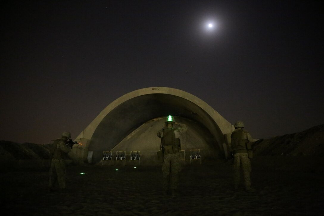 U.S. Marines with Headquarters Company, 3rd Battalion, 7th Marine Regiment, Special Purpose Marine Air-Ground Task Force-Crisis Response-Central Command, shoot targets from 25 meters during a night range in Southwest Asia, Aug. 8, 2015. These Marines provide security at one of the SPMAGTF operating bases in the Middle East. The Marines and Sailors of SPMAGTF-CR-CC offer rapid, task-organized solutions to the commander of USCENTCOM across an area of operations spanning 20 countries.