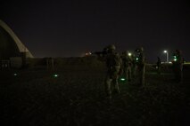 U.S. Marines with Headquarters Company, 3rd Battalion, 7th Marine Regiment, Special Purpose Marine Air-Ground Task Force-Crisis Response-Central Command, fire their rifles during a night range in Southwest Asia, Aug. 8, 2015. These Marines provide security at one of the SPMAGTF operating bases in the Middle East. The Marines and Sailors of SPMAGTF-CR-CC offer rapid, task-organized solutions to the commander of USCENTCOM across an area of operations spanning 20 countries.