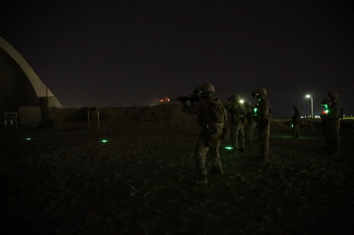 U.S. Marines with Headquarters Company, 3rd Battalion, 7th Marine Regiment, Special Purpose Marine Air-Ground Task Force-Crisis Response-Central Command, fire their rifles during a night range in Southwest Asia, Aug. 8, 2015. These Marines provide security at one of the SPMAGTF operating bases in the Middle East. The Marines and Sailors of SPMAGTF-CR-CC offer rapid, task-organized solutions to the commander of USCENTCOM across an area of operations spanning 20 countries.