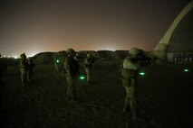 U.S. Marines with Headquarters Company, 3rd Battalion, 7th Marine Regiment, Special Purpose Marine Air-Ground Task Force-Crisis Response-Central Command, fire their rifles during a night range in Southwest Asia, Aug. 8, 2015. These Marines provide security at one of the SPMAGTF operating bases in the Middle East. The Marines and Sailors of SPMAGTF-CR-CC offer rapid, task-organized solutions to the commander of USCENTCOM across an area of operations spanning 20 countries.