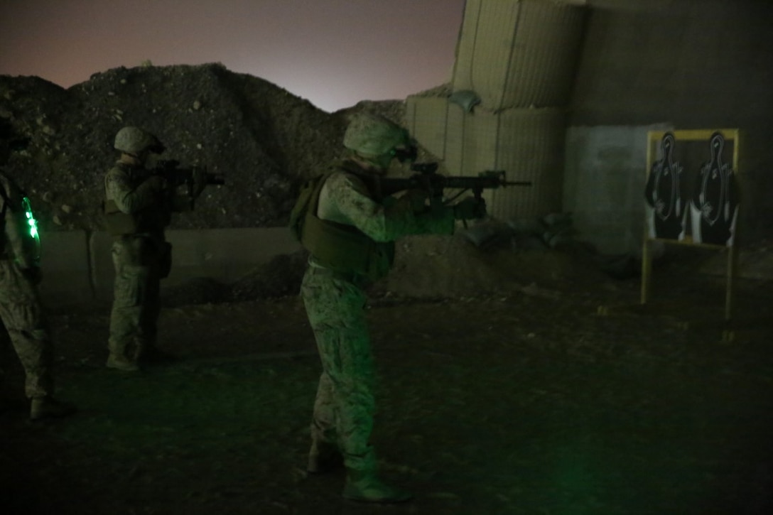 U.S. Marines with Headquarters Company, 3rd Battalion, 7th Marine Regiment, Special Purpose Marine Air-Ground Task Force-Crisis Response-Central Command, fire their rifles at close-range targets during a night range in Southwest Asia, Aug. 8, 2015. These Marines provide security at one of the SPMAGTF operating bases in the Middle East. The Marines and Sailors of SPMAGTF-CR-CC offer rapid, task-organized solutions to the commander of USCENTCOM across an area of operations spanning 20 countries.