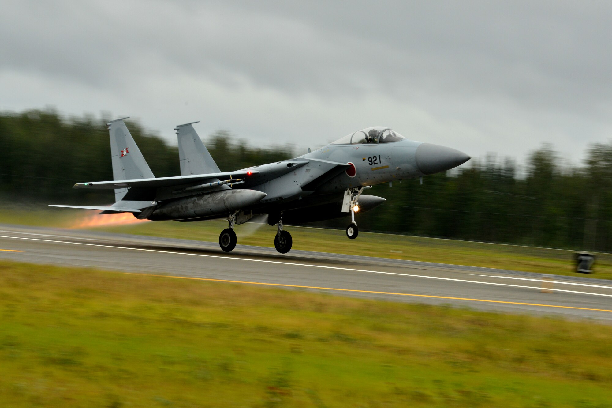 A Japan Air Self-Defense Force (JASDF) F-15J/DJ Eagle lifts off from the Eielson Air Force Base, Alaska, flightline Aug. 10, 2015, as part of the first simulated combat sortie of RED FLAG-Alaska 15-3. The JASDF is participating in this Pacific Air Forces commander-directed field training exercise for U.S. and partner nation forces, providing combined offensive counter-air, interdiction, close air support, and large force employment training in a simulated combat environment. (U.S. Air Force photo by Airman 1st Class Kyle Johnson/Released)