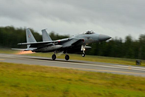 A Japan Air Self-Defense Force (JASDF) F-15J/DJ Eagle lifts off from the Eielson Air Force Base, Alaska, flightline Aug. 10, 2015, as part of the first simulated combat sortie of RED FLAG-Alaska 15-3. The JASDF is participating in this Pacific Air Forces commander-directed field training exercise for U.S. and partner nation forces, providing combined offensive counter-air, interdiction, close air support, and large force employment training in a simulated combat environment. (U.S. Air Force photo by Airman 1st Class Kyle Johnson/Released)