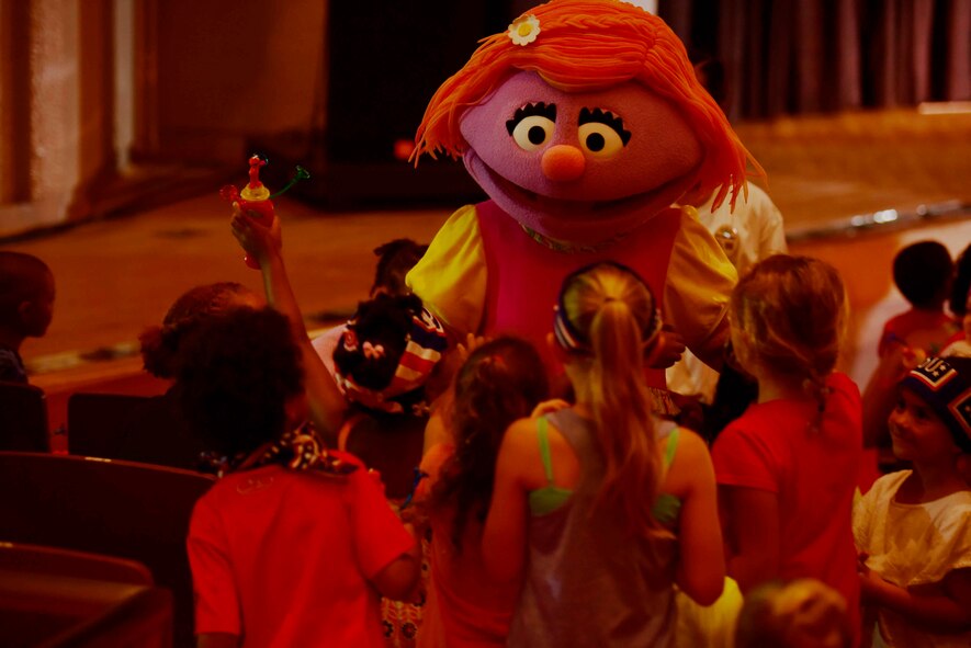 Children of U.S. Service members stationed at Misawa Air Base meet Katie, a Sesame Street character, at the Misawa Civic Center, Japan, Aug. 10, 2015. Katie, a military child, was introduced to the show in 2011 to relate to U.S. services children living around the world. (U.S. Air Force photo by Airman 1st Class Jordyn Fetter/Released)
