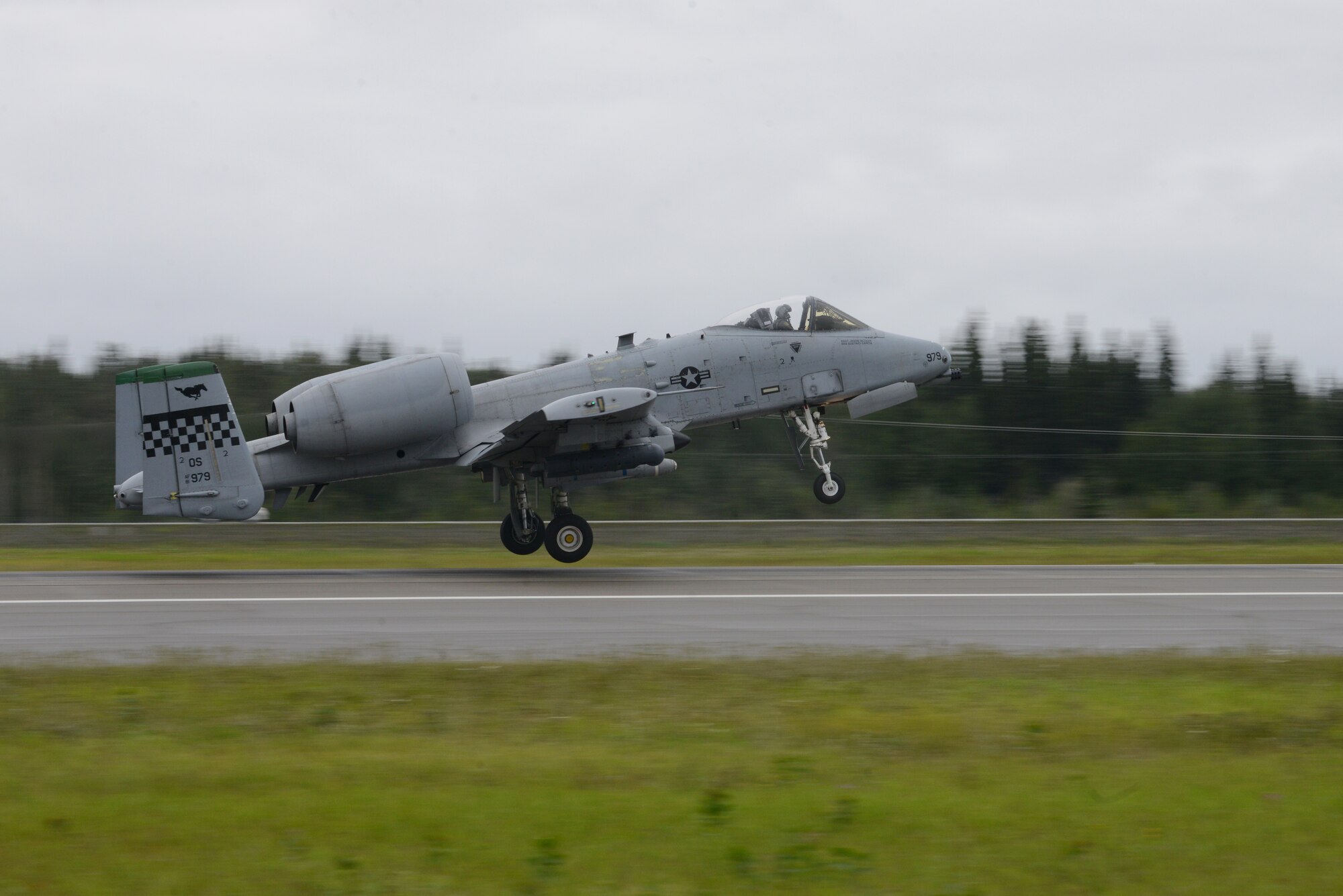 A U.S. Air Force A-10 Thunderbolt II assigned to the 25th Fighter Squadron, Osan Air Base, Republic of Korea, takes off from Eielson Air Force Base, Alaska, Aug. 10, 2015, during RED FLAG-Alaska (RF-A) 15-3. RF-A is a series of Pacific Air Forces commander-directed field training exercises for U.S. and partner nation forces, providing combined offensive counter-air, interdiction, close air support and large force employment training in a simulated combat environment. (U.S. Air Force photo by Senior Airman Ashley Nicole Taylor/Released)