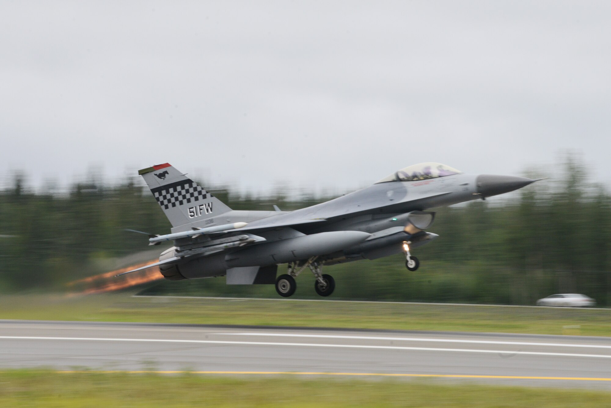 A U.S. Air Force F-16 Fighting Falcon assigned to the 36th Fighter Squadron, Osan Air Base, Republic of Korea, takes off from Eielson Air Force Base, Alaska, Aug. 10, 2015, during RED FLAG-Alaska (RF-A) 15-3. RF-A is a series of Pacific Air Forces commander-directed field training exercises for U.S. and partner nation forces, providing combined offensive counter-air, interdiction, close air support and large force employment training in a simulated combat environment. (U.S. Air Force photo by Senior Airman Ashley Nicole Taylor/Released)