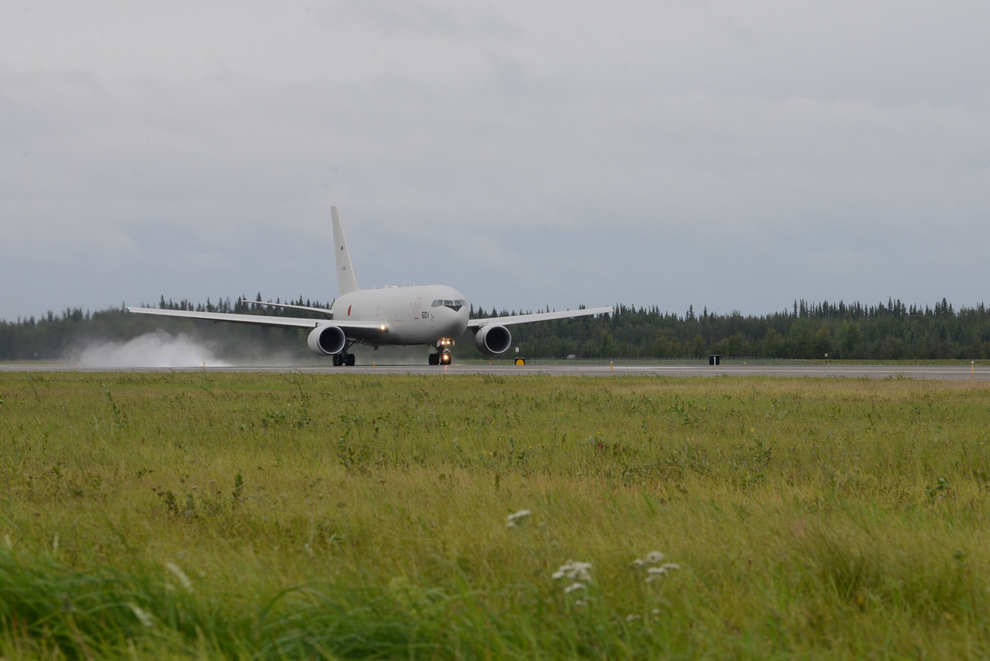 A Japan Air Self-Defense Force KC-767 tanker takes off from Eielson Air Force Base, Alaska, Aug. 10, 2015, during RED FLAG-Alaska (RF-A) 15-3. RF-A is a series of Pacific Air Forces commander-directed field training exercises for U.S. and partner nation forces, providing combined offensive counter-air, interdiction, close air support and large force employment training in a simulated combat environment. (U.S. Air Force photo by Senior Airman Ashley Nicole Taylor/Released)