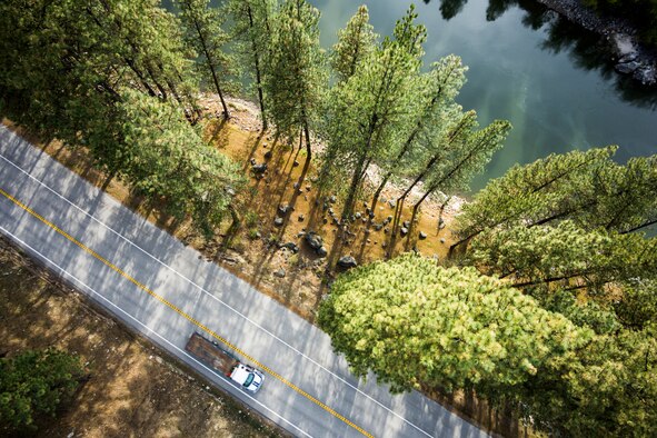 A truck drives north through Boise National Forest on Highway 55 in Idaho April 12, 2015. The three-hour drive from Mountain Home to McCall may seem long to some, but the scenery along the way could be worth the trip by itself. (Courtesy photo by Samuel Morse)