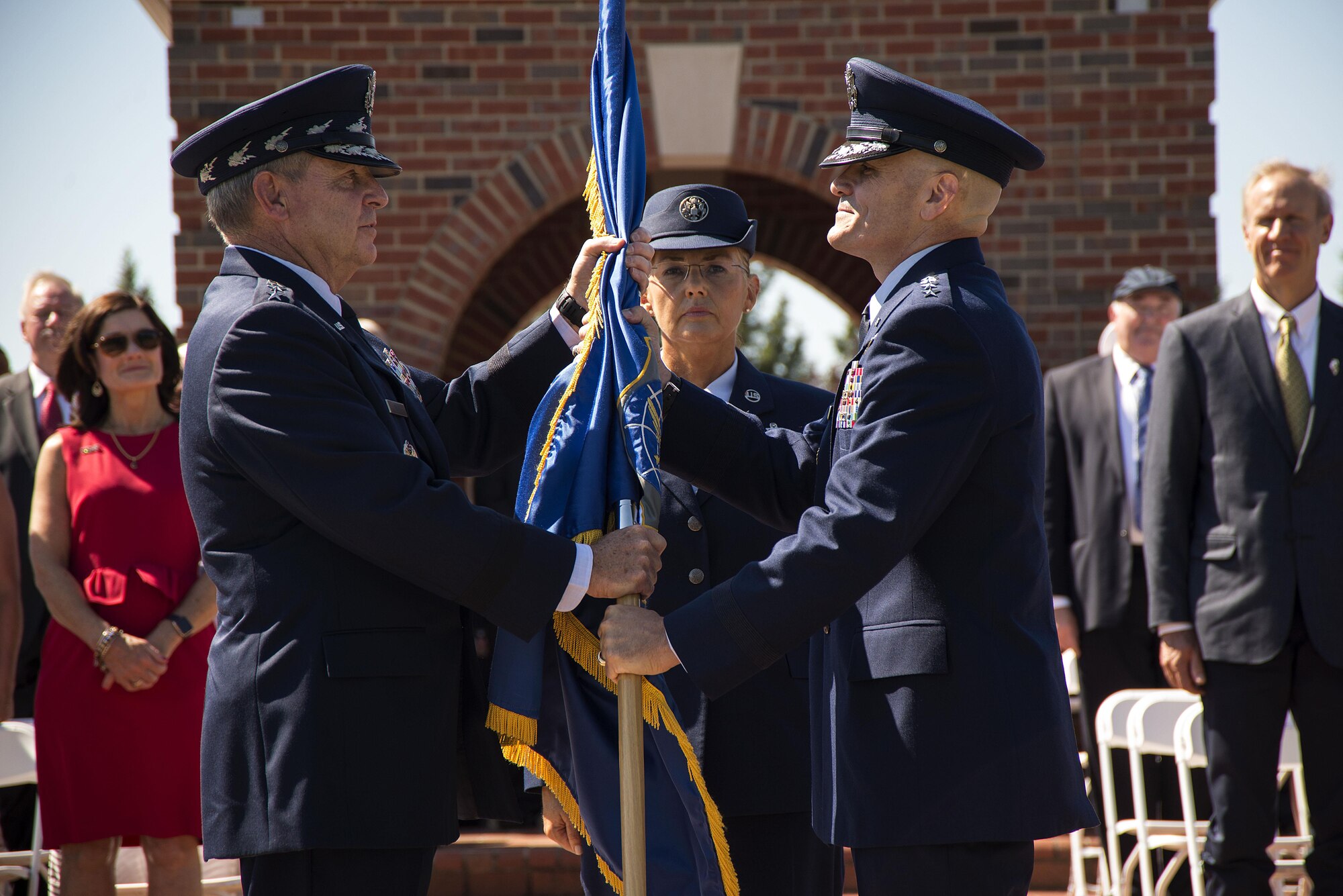 Gen. Mark A. Welsh III, Chief of Staff of the Air Force, passes Air Mobility Command’s guidon to Gen. Carlton D. Everhart II during the AMC’s change of command ceremony at Scott Air Force Base, Illinois, August 11, 2015. Everhart is the 12th commander of AMC since its activation June 1, 1992. Everhart was previously the 18th Air Force Commander here. (U.S. Air Force photo/ Senior Airman Jake Eckhardt)