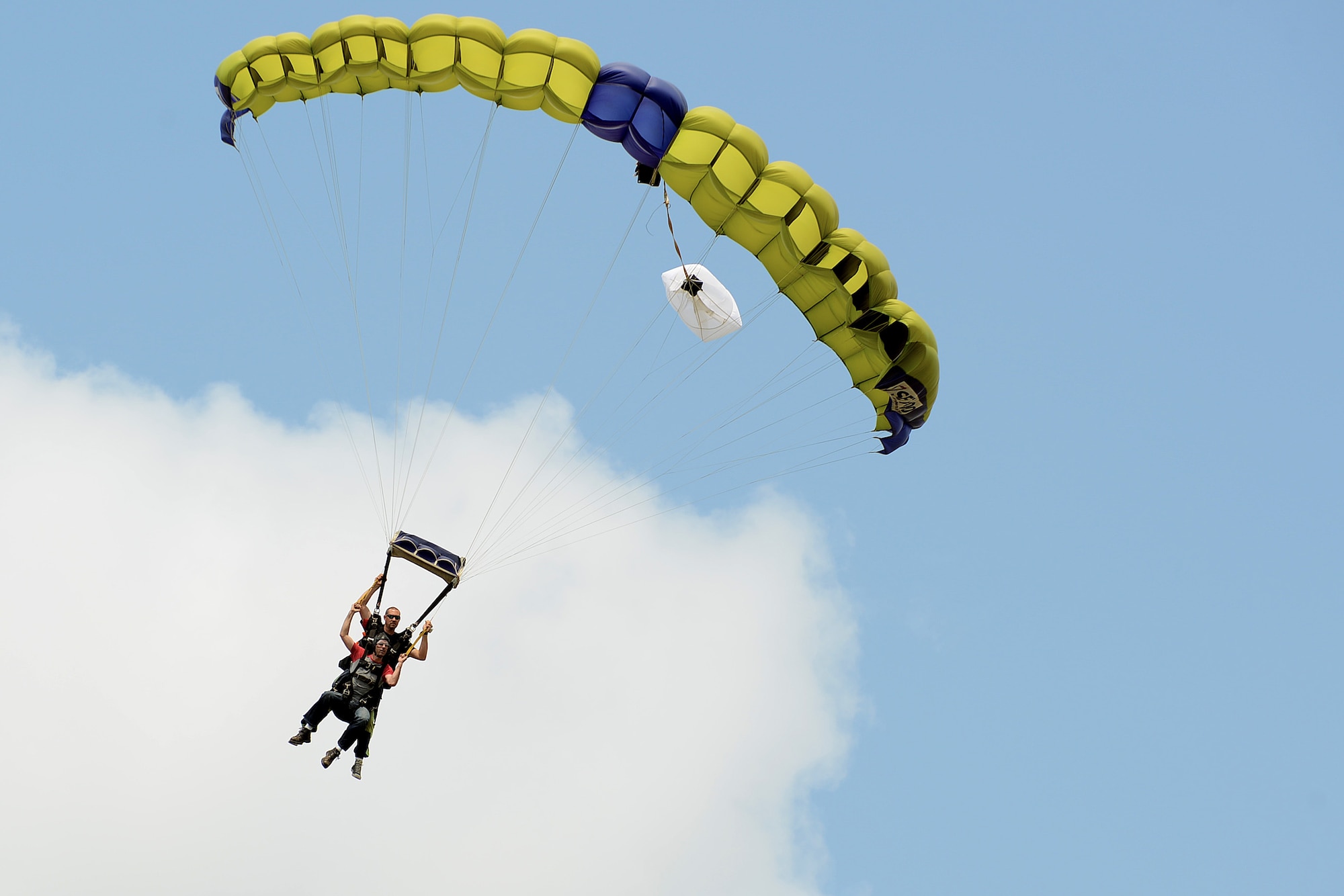 A U.S. Air Force Airman parachutes after freefalling out of an airplane at a 20th Force Support Squadron skydiving event at Walterboro, S.C., Aug. 1, 2015. Three trips were scheduled to take Team Shaw members skydiving at an affordable cost. (U.S. Air Force photo by Senior Airman Michael Cossaboom/Released)