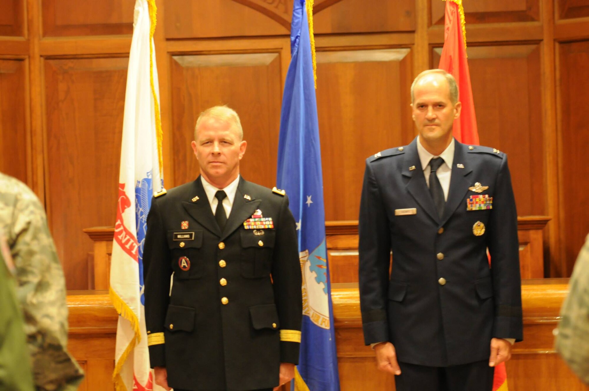 Maj. Gen. Timothy P. Williams, the Adjutant General of Virginia, promotes Brig. Gen. Dean A. Tremps, Air Component Commander of the Virginia National Guard, during a ceremony held Aug. 9, 2015 at Joint Base Langley-Eustis. Tremps assumed command of the Virginia ANG effective May 27, 2015. (U.S. Air National Guard photo by Tech. Sgt. Meghan Skrepenski/Released)