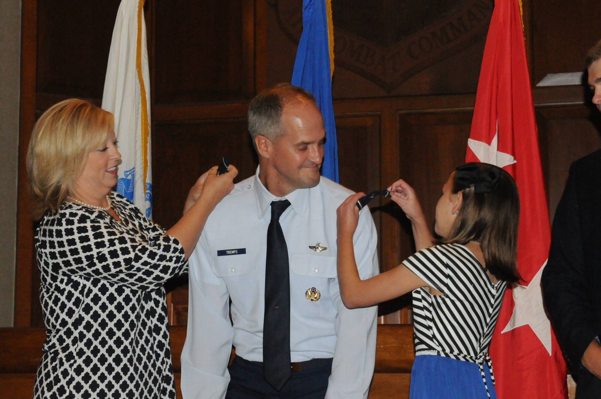 Maj. Gen. Timothy P. Williams, the Adjutant General of Virginia, promotes Brig. Gen. Dean A. Tremps, Air Component Commander of the Virginia National Guard, during a ceremony held Aug. 9, 2015 at Joint Base Langley-Eustis. Tremps assumed command of the Virginia ANG effective May 27, 2015. (U.S. Air National Guard photo by 1st. Lt. M. Selki/Released)