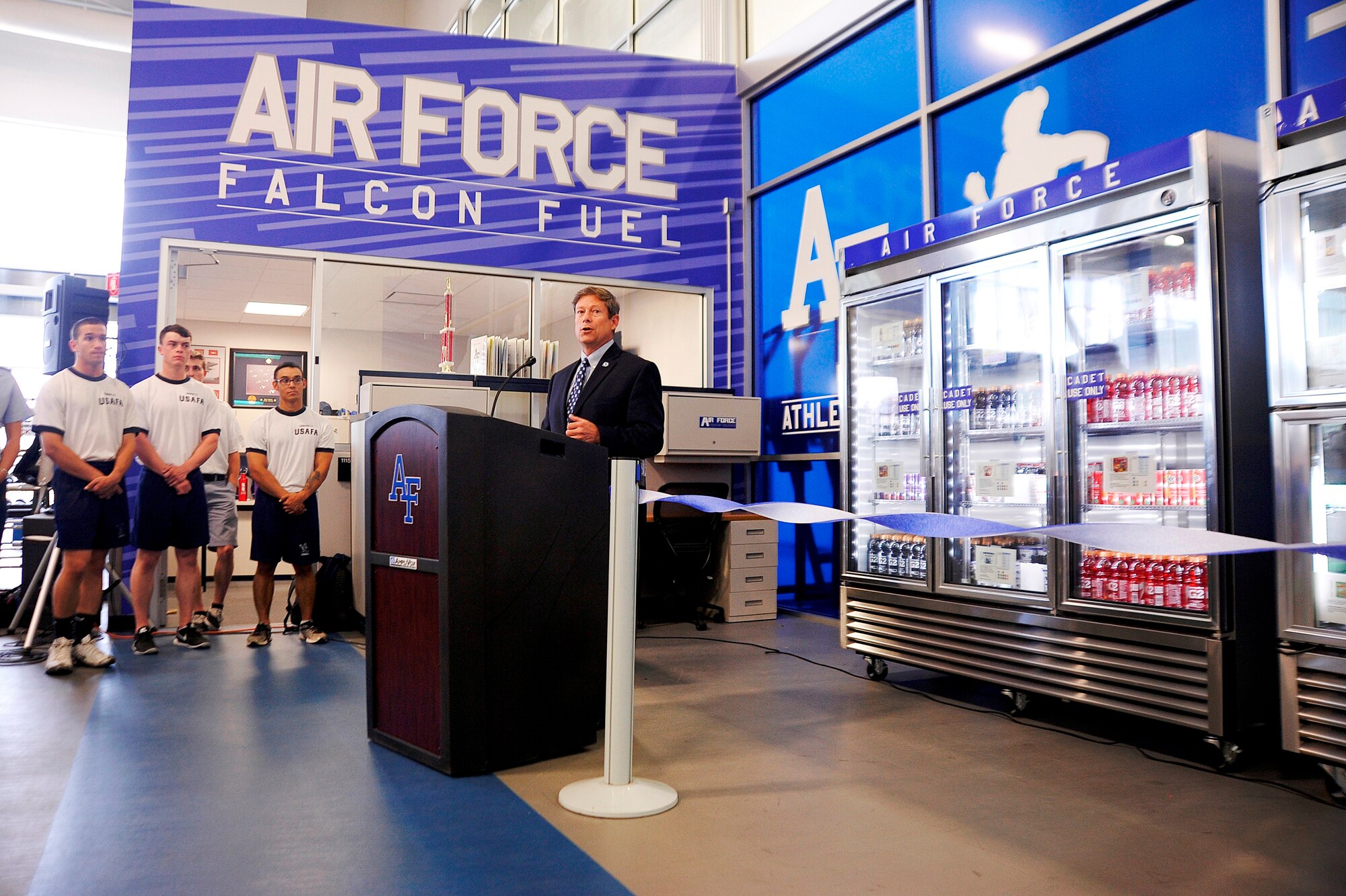 Jim Knowlton, the U.S Air Force Academy's athletic director, speaks at the Falcon Fuel ribbon cutting ceremony Aug. 5, 2015. The Falcon Fuel program provides cadets with extra nutrition by placing 12 healthy food stations near cadet workout areas. (U.S. Air Force photo/Mike Kaplan) 