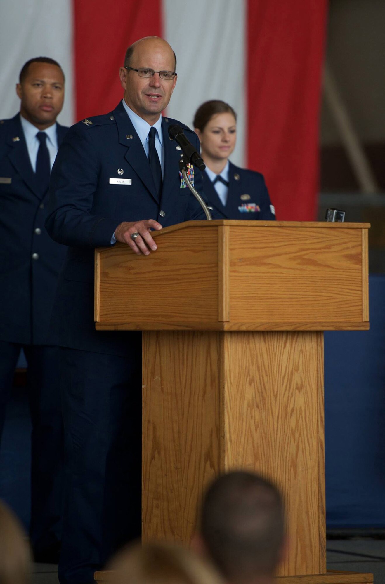 Col. Raymond A. Kozak, the new commander of the 349th Air Mobility Wing, speaks to Travis and community partners during change of command ceremony at Travis Air Force Base, Calif., Aug. 8, 2015. Kozak will lead more than 3,100 combat-ready Citizen Airmen, flying and maintaining the C-17 Globemaster III, C-5 Galaxy and KC-10 Extender mobility aircraft. Kozak assumed command of the wing from Col. Matthew J. Burger, who will assume duties in the Pentagon as the Programs and Requirements Division chief, Air Force Reserve Command. (U.S. Air Force photo/Ken Wright)