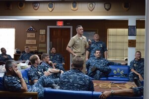 Command Master Chief Richard Curtis, director of the Senior Enlisted Academy at the Naval War College in Newport, R.I., met with those in the ranks of chief petty officer and below about the changes to the SEA during an all call Aug. 6, 2015 at the Red Bank Club on Joint Base Charleston - Weapons Station, S.C. One of the changes to the Navy SEA is that it will now be a requirement to advance to the rank of master chief. The Navy SEA provides senior enlisted leaders education in communication skills, leadership and management, national security affairs, Navy programs, and physical fitness. It is also the Navy's only Professional Military Education institute for its senior enlisted force. With a capacity of supporting more than 1,200 students annually, the SEA is attended by active and reserve personnel from the U.S. Navy, Air Force, Army, Army National Guard, Coast Guard, and Marine Corps, as well as International Service partners. (U.S. Air Force photo / Airman 1st Class Thomas Charlton)
 
   