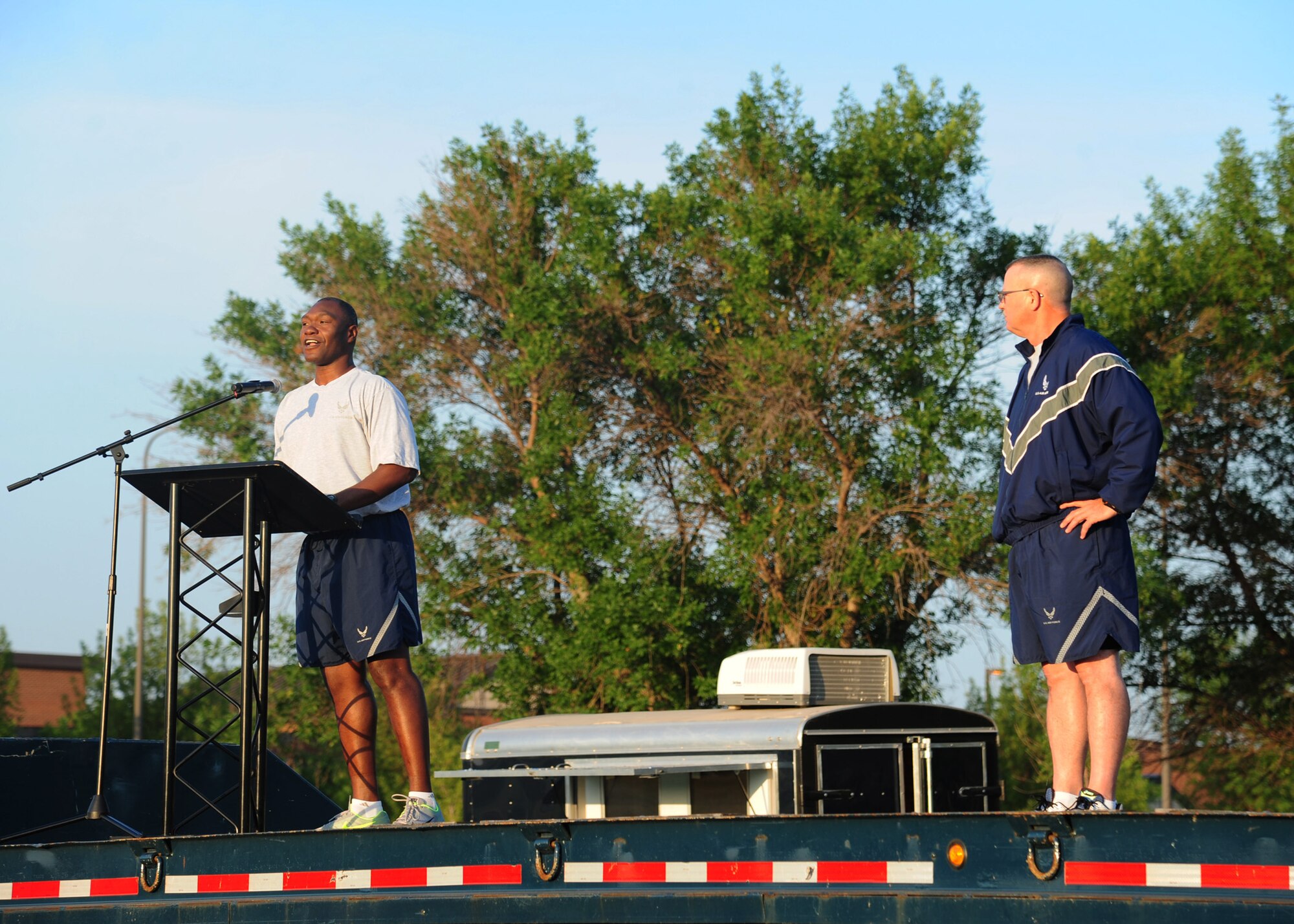Col. Rodney Lewis, 319th Air Base Wing commander, speaks before a wing run event August 6, 2015, on Grand Forks Air Force Base, N.D. Airmen completed a two-mile run as a way to foster wingmanship. (U.S. Air Force photo by Airman 1st Class Ryan Sparks/released)