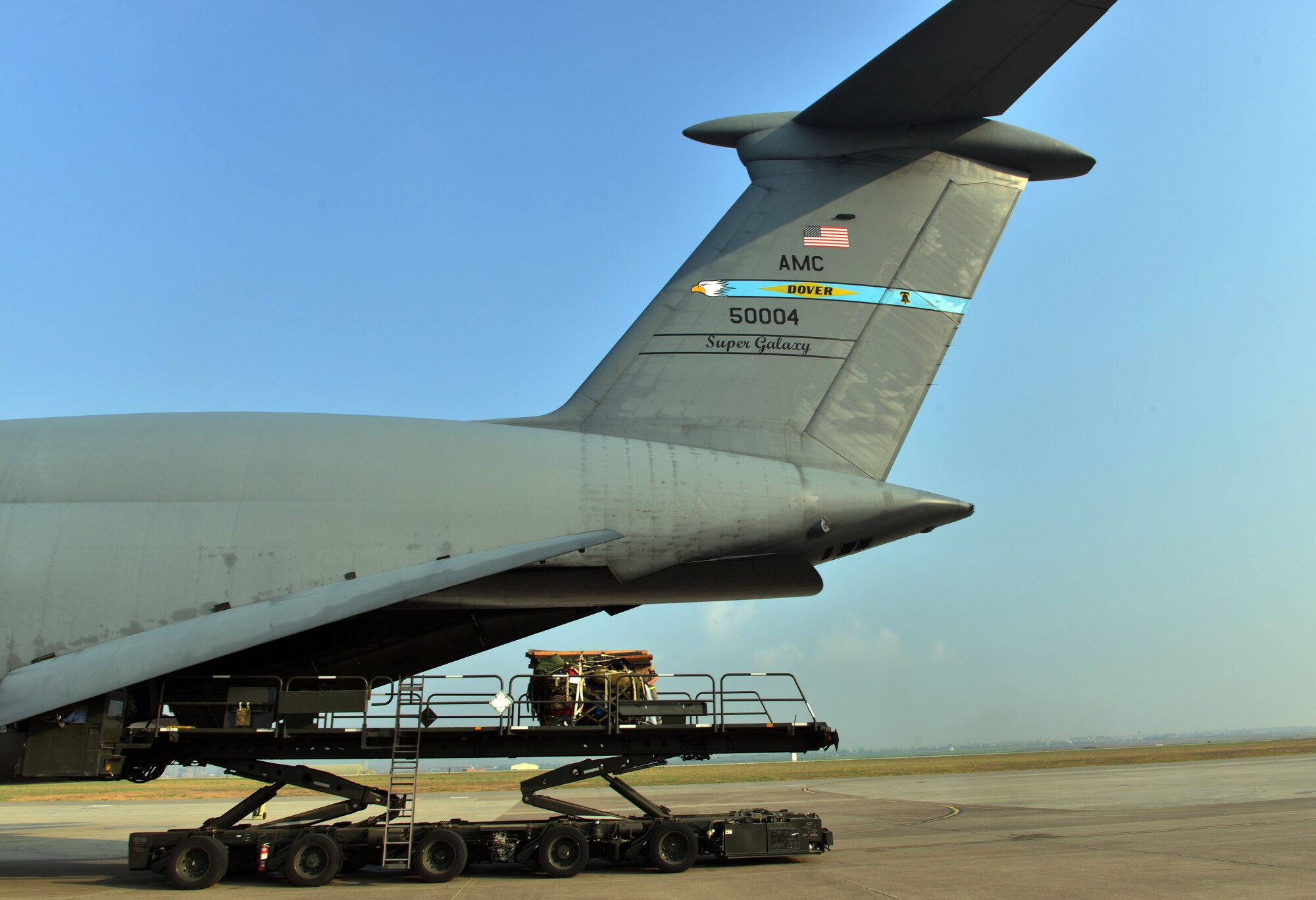 Equipment is unloaded from a C-5M Super Galaxy from Dover Air Force Base, Del. in support of Operation Inherent Resolve Aug. 9, 2015, at Incirlik Air Base, Turkey. The U.S. and Turkey, as members of the 60-plus nation coalition, are committed to the fight against ISIL in pursuit of peace and stability in the region. (U.S. Air Force photo by Senior Airman Michael Battles/Released)